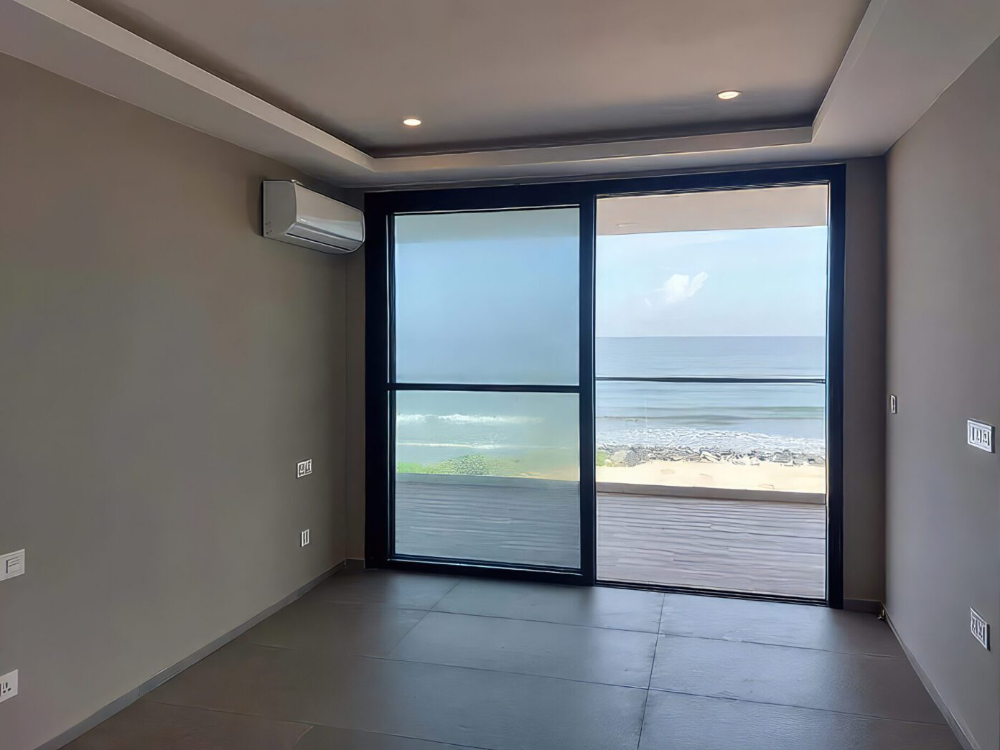 product-name:Unfurnished 2-bed Apartment with Prime Ocean View – Long Term Rent | Kololi ,supplier-name:Gamrealty Rea-estate