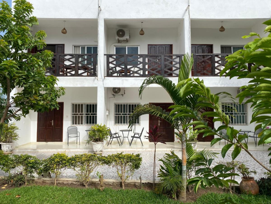 Queen Zee Garden Apartments logo